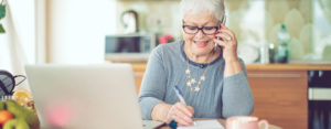 landlord on the phone writing down information