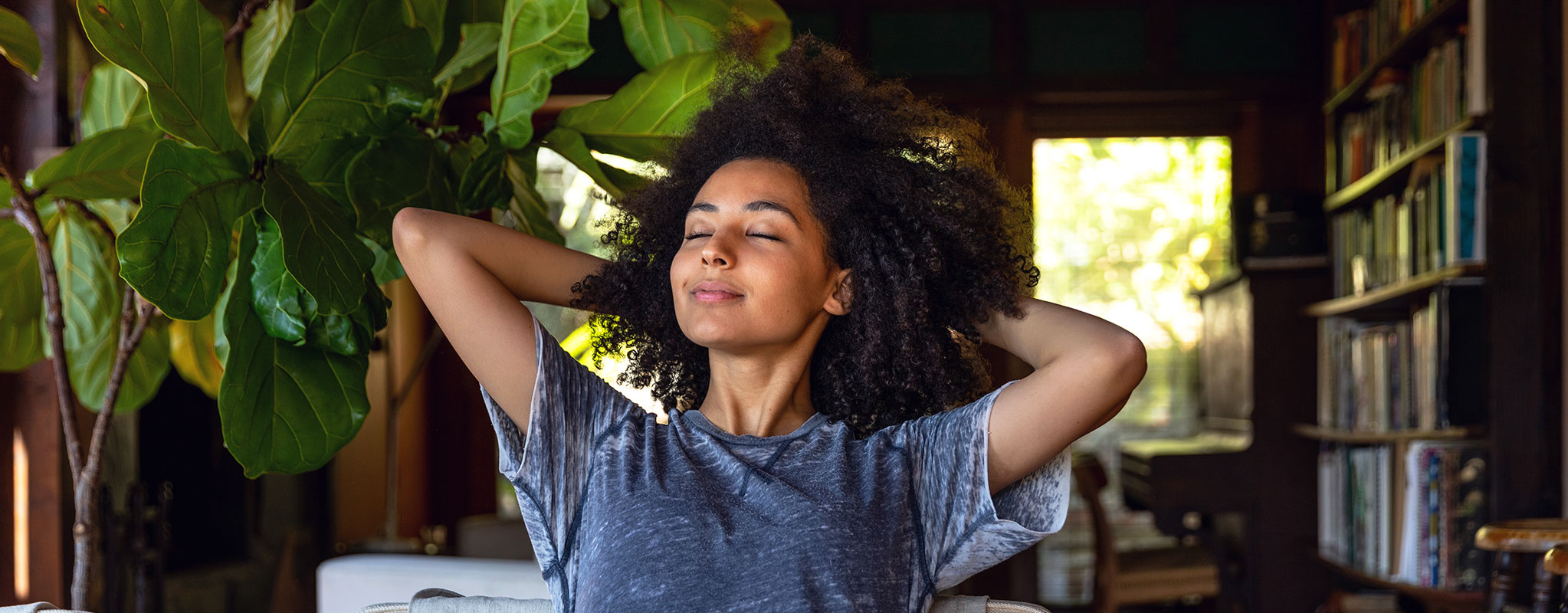 woman relaxing with eyes closed in a breeze