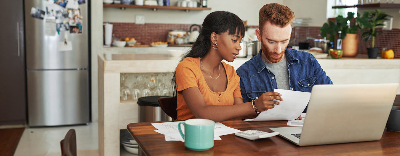 Couple looking at a rent increase letter