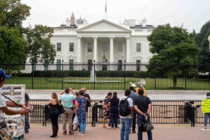 People gather in front of the White House