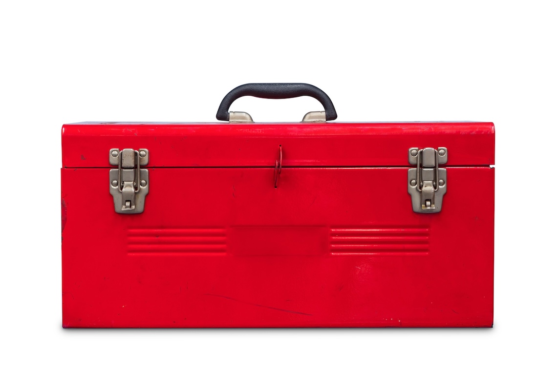 red toolbox holding digital property management tools