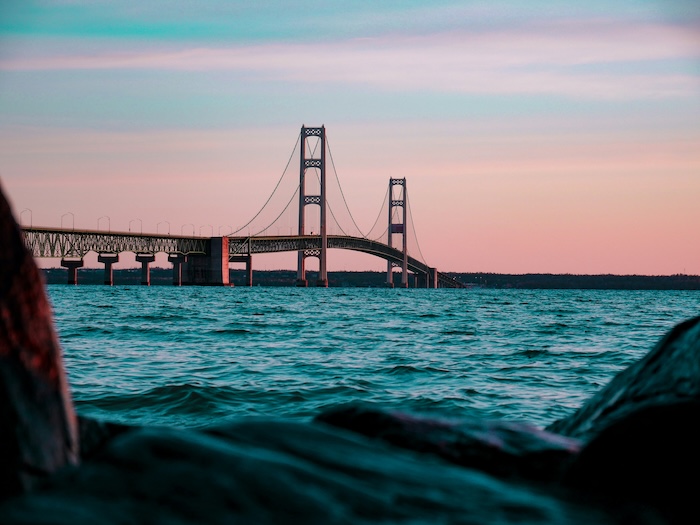 Lake and bridge in Michigan at sunset
