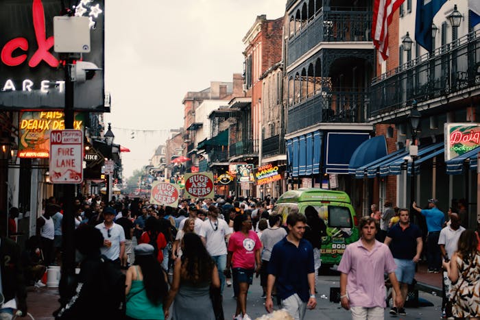 People Walking on Paved Road in New Orleans, Louisiana, US.